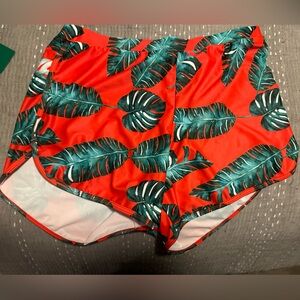 Red swim shorts large with floral print